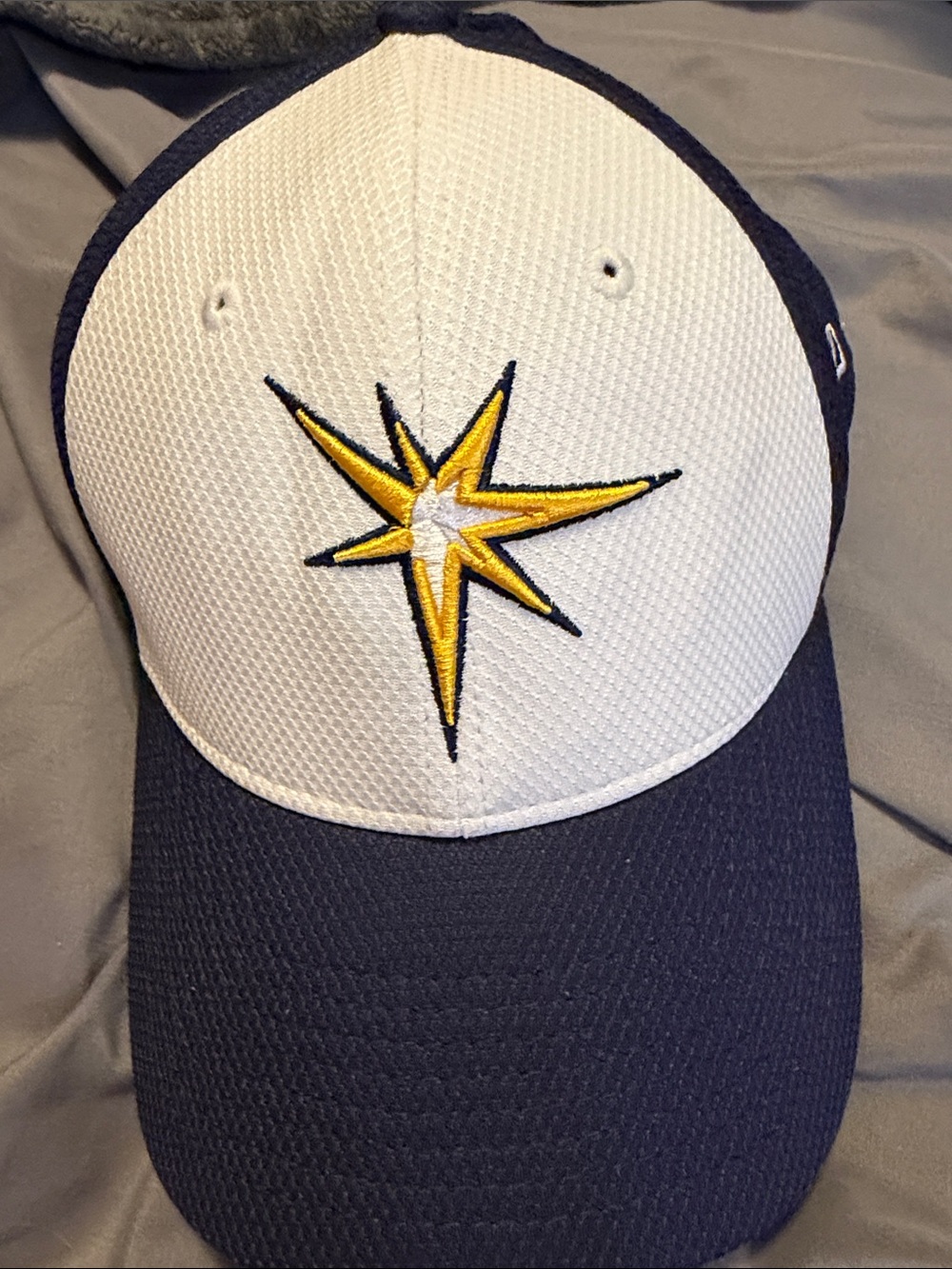New Era Navy and White Baseball Cap with Yellow Star Logo